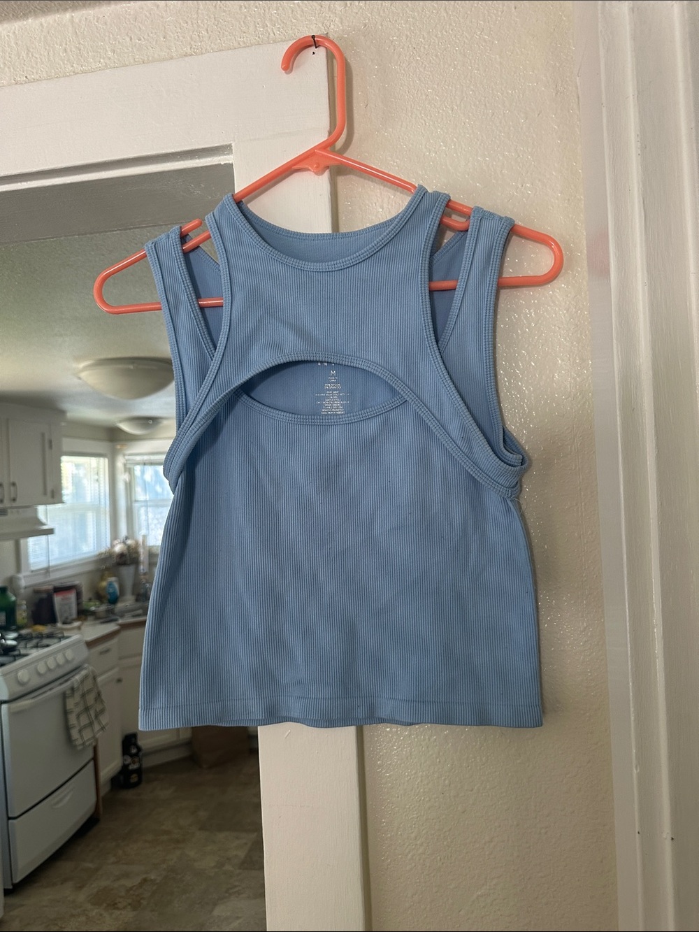 Peek-a-boo shirt. Blue ribbed. Size Medium